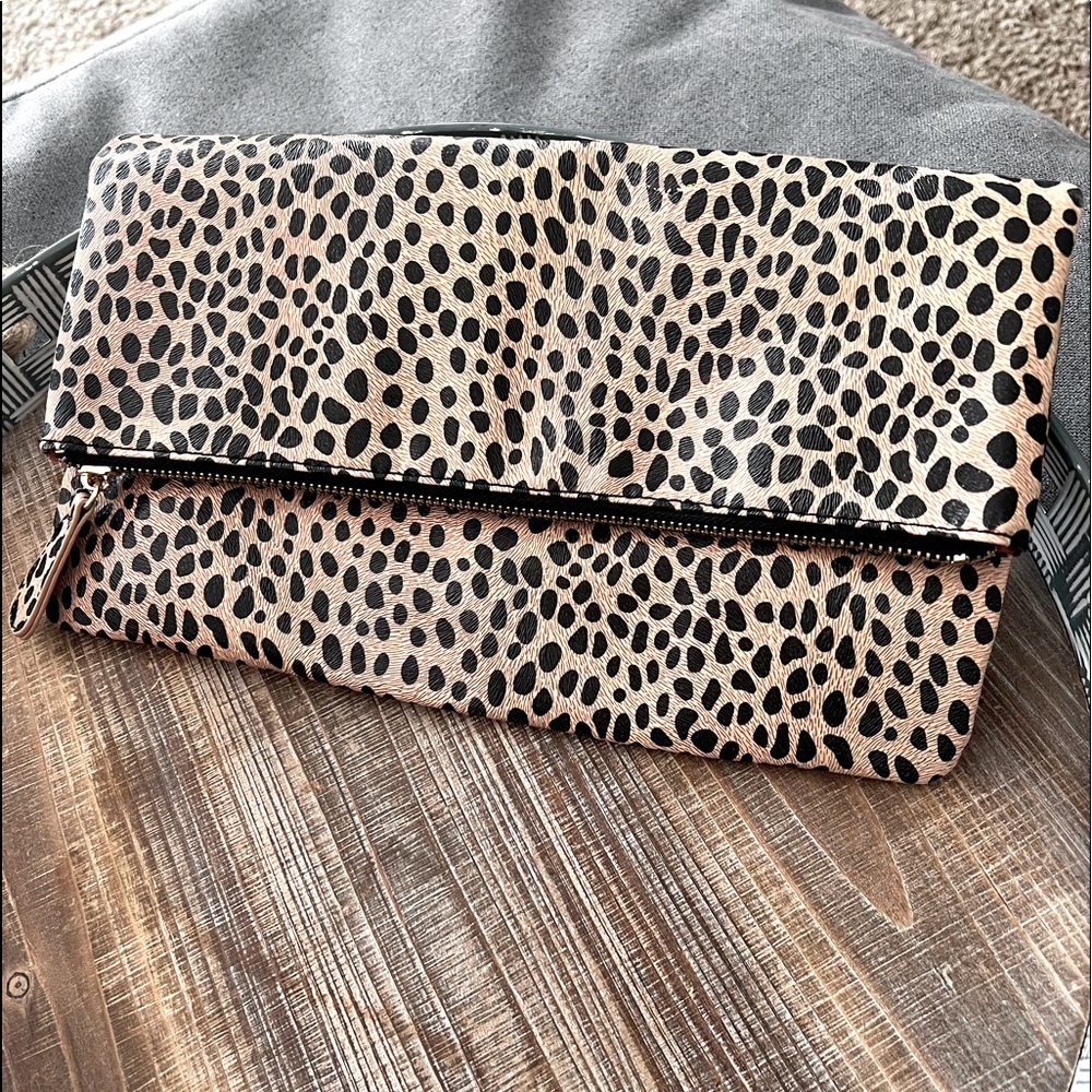 Cute animal print clutch, only used twice, lots of room!